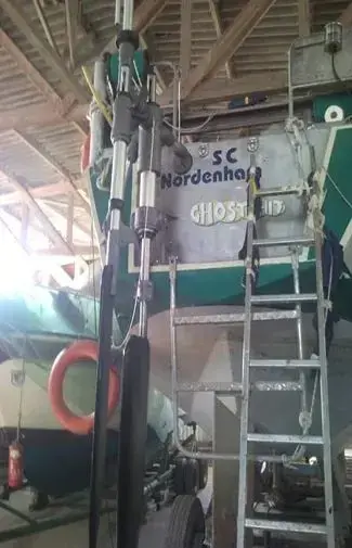 Auxiliary rudder fully deployed and actively steering the yacht