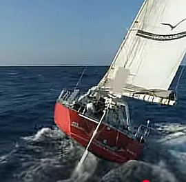 photo of boat heeling affecting off-center rudder submersion
